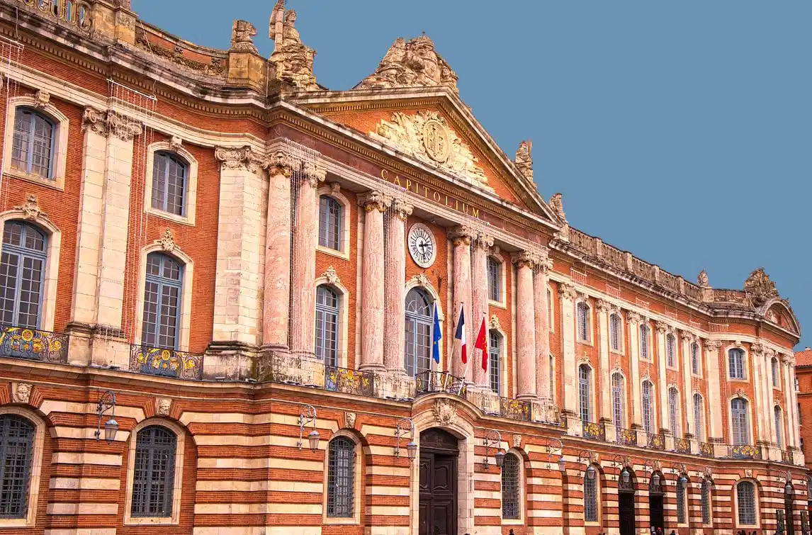 Front view of the Capitole de Toulouse, historic city hall with neoclassical architecture