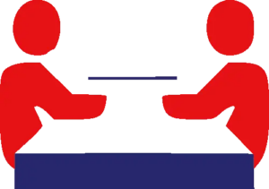 Icon of a private French lesson with two people sitting at a table facing each other