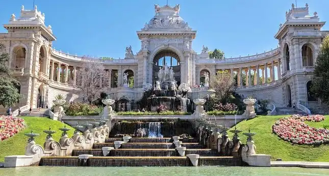 Palais Longchamp in Marseille with cascading fountain, garden and neoclassical colonnade