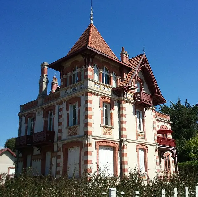 Red brick and white stone villa in Belle Époque style in Arcachon, France