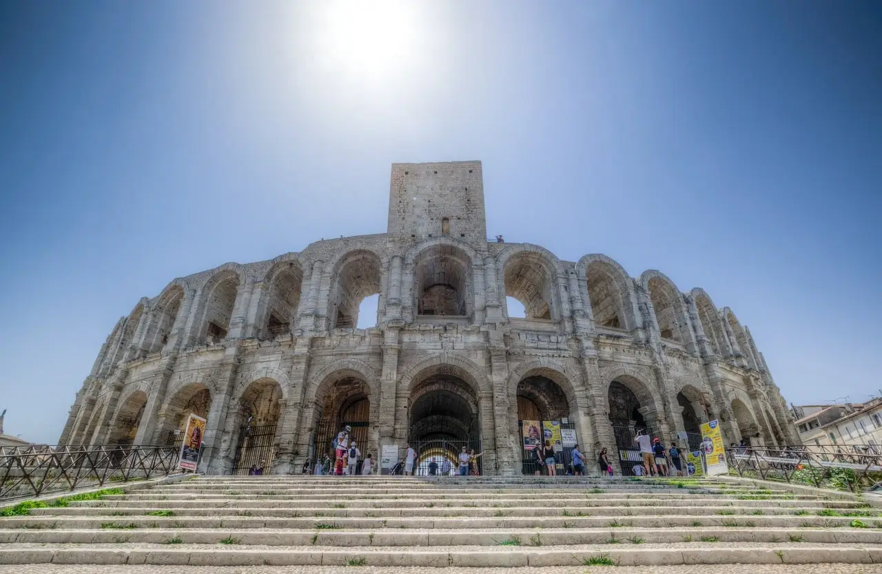 Roman amphitheatre in Arles, Provence, France under a bright summer sky