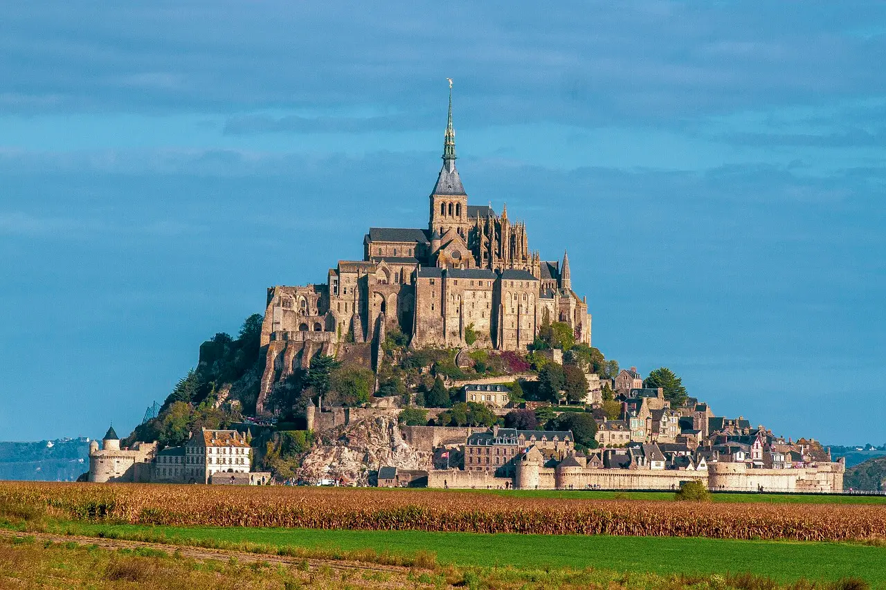 The Mont-Saint-Michel abbey and medieval village rising from the bay in Normandy, France