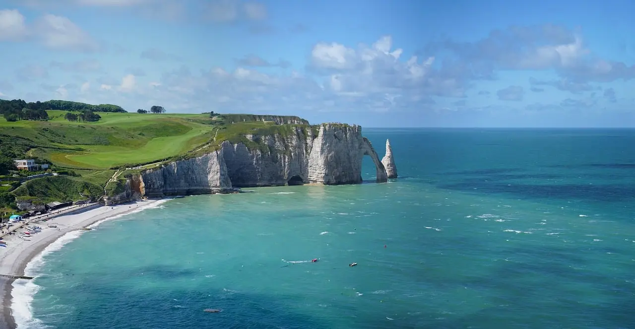 View of the chalk cliffs and sea arch at Étretat on the Normandy coast of France