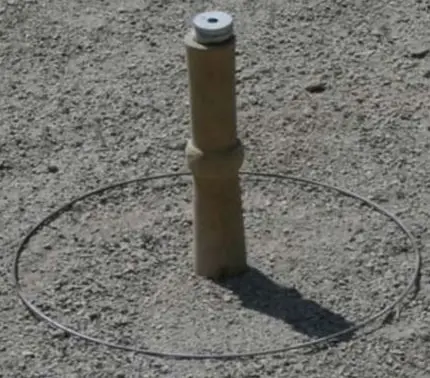 Wooden post and metal ring used in the traditional French game of palet