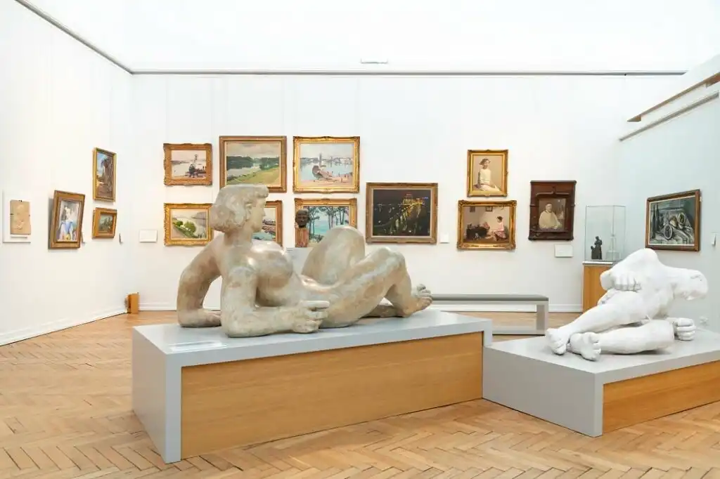 Art gallery room with sculptures and framed paintings at the Musée des Beaux-Arts de Bordeaux