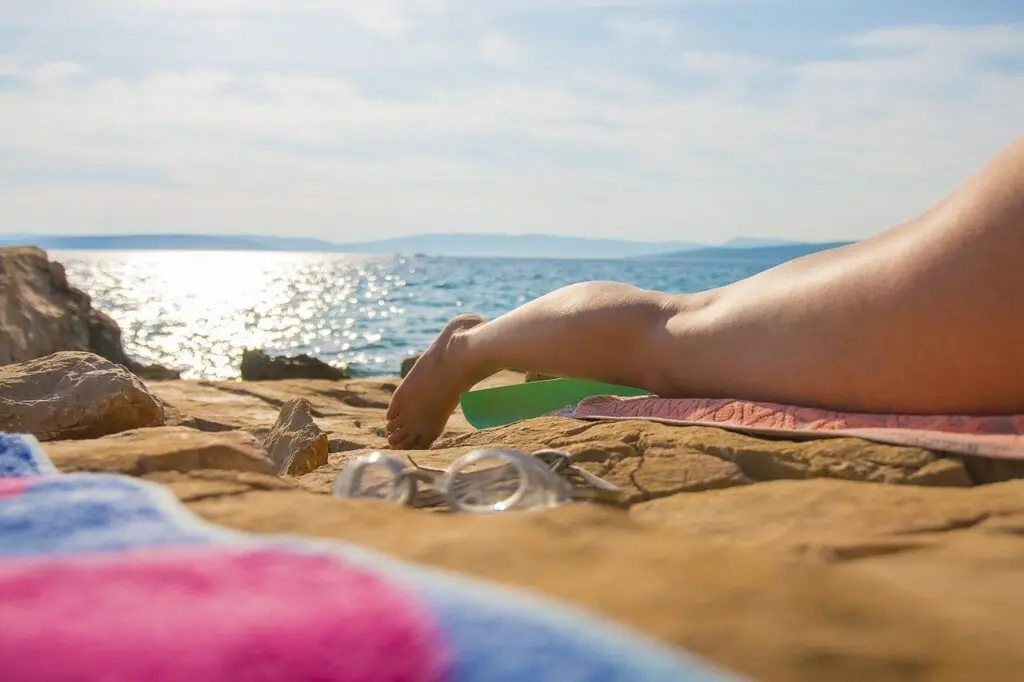 Relaxing by the sea on a rocky beach near Montpellier, France