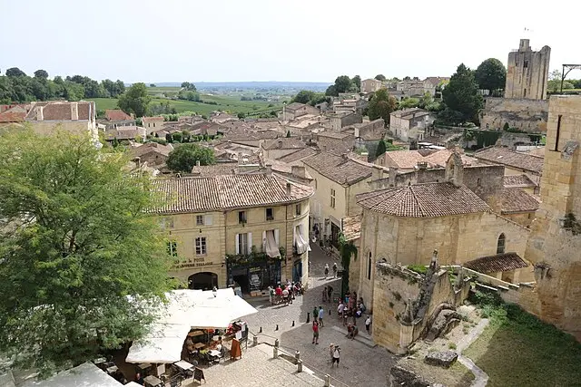Panoramic view of Saint-Émilion with cobbled streets, medieval houses and wine shops in the heart of Bordeaux vineyards