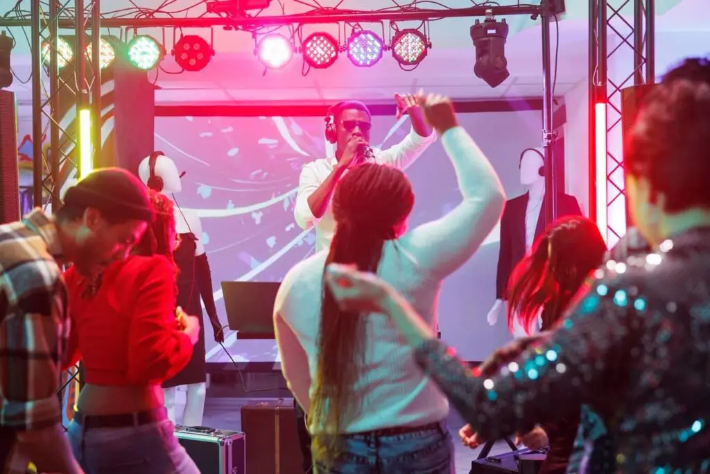 French immersion students having fun at a DJ party in Bordeaux – cultural nightlife experience